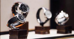 Men's watches in a showcase of a luxury store in London.