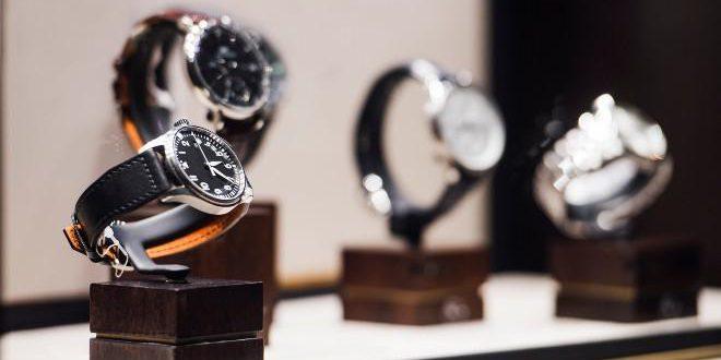 Men's watches in a showcase of a luxury store in London.
